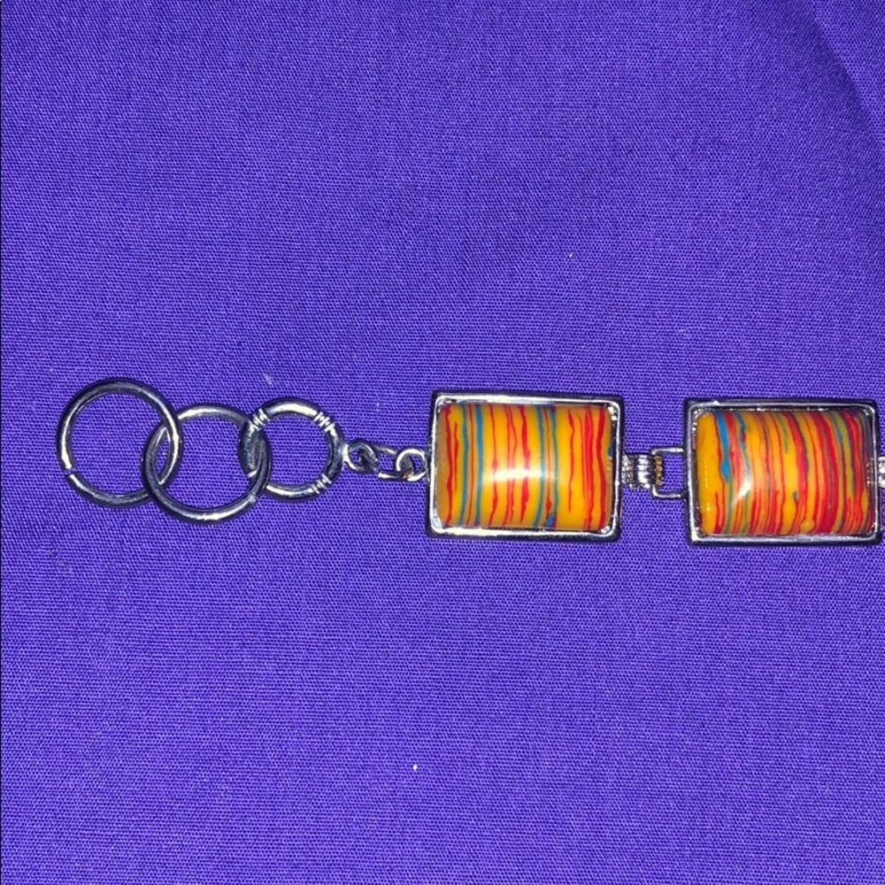Orange resin striped bracelet 8”‎